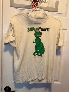 Scholastic SuperPrint! Cream Tee with Green Dinosaur Graphic